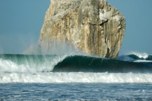 Witch’s Rock and a wave