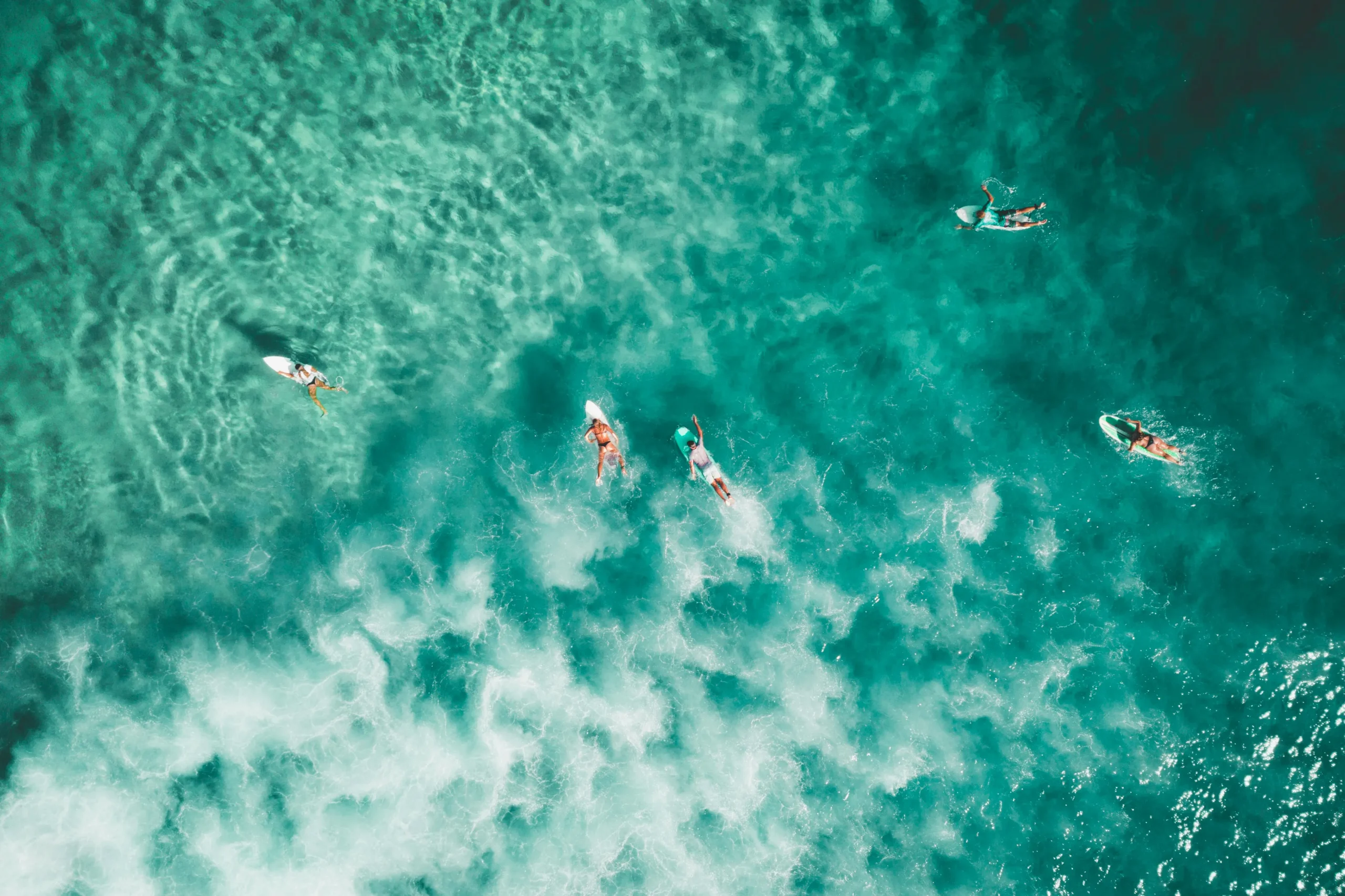 surfers in a water